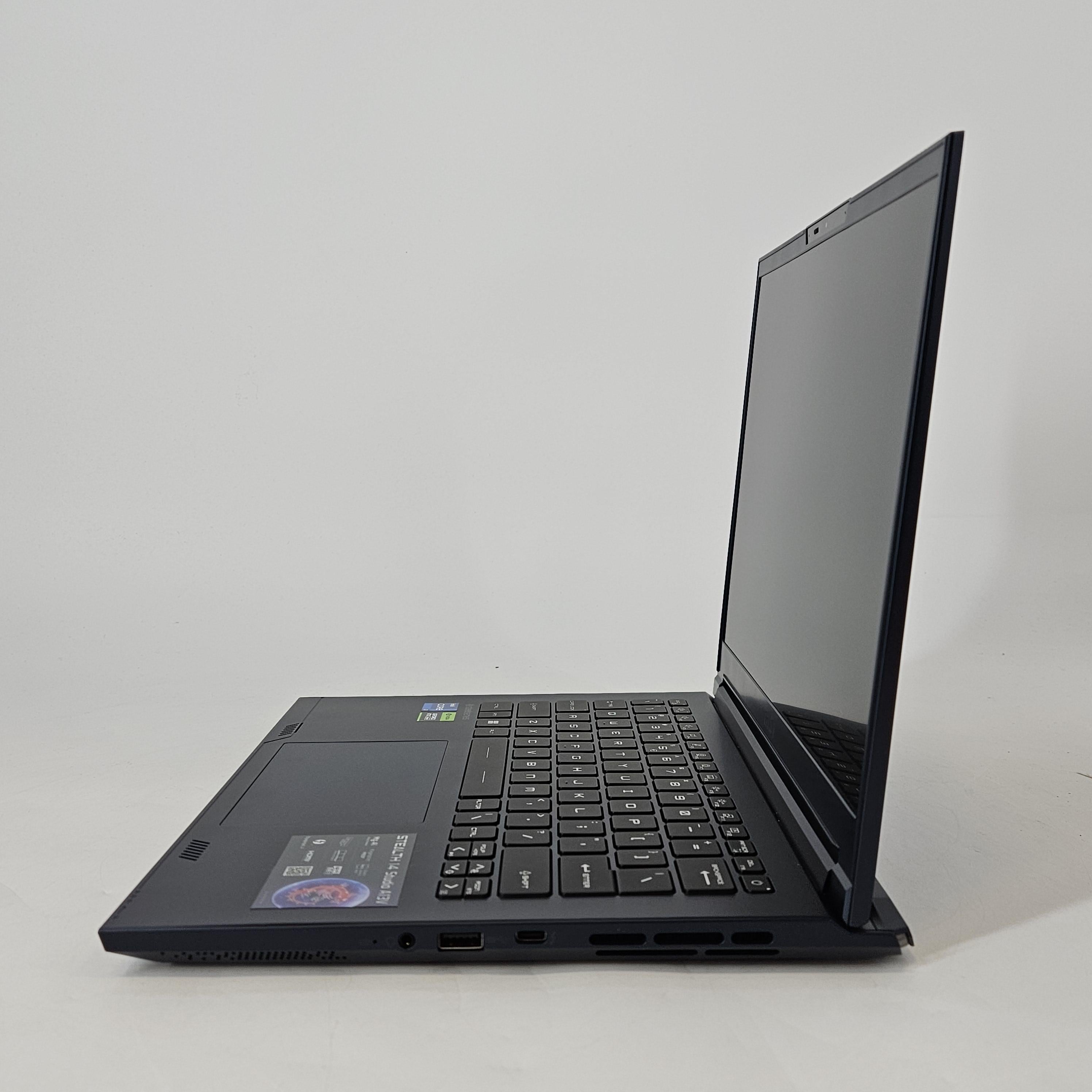 MSI Stealth 14 Studio 14 Blue 2.4 GHz Intel Core i7 13th Gen. 16GB RAM 1TB Solid State Drive NVIDIA GeForce RTX 4060 8 GB