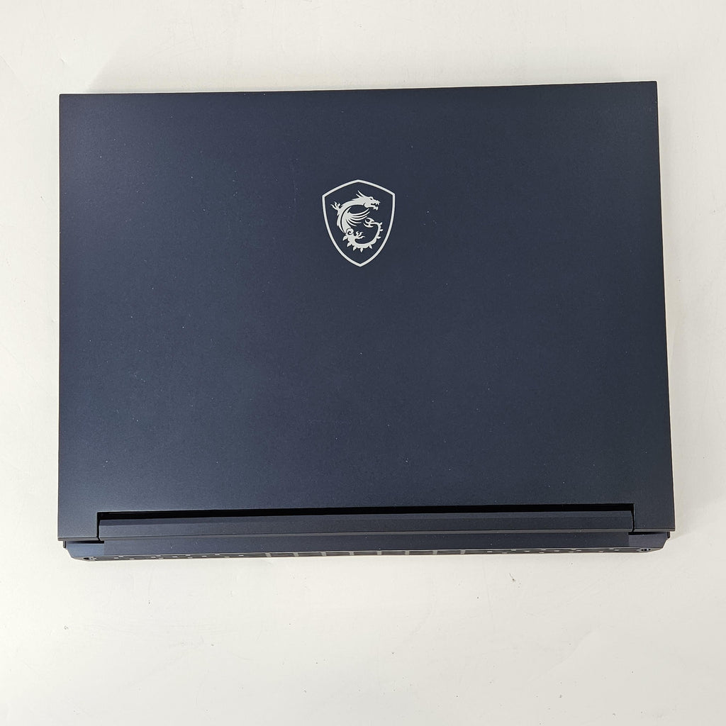 MSI Stealth 14 Studio 14 Blue 2.4 GHz Intel Core i7 13th Gen. 16GB RAM 1TB Solid State Drive NVIDIA GeForce RTX 4060 8 GB