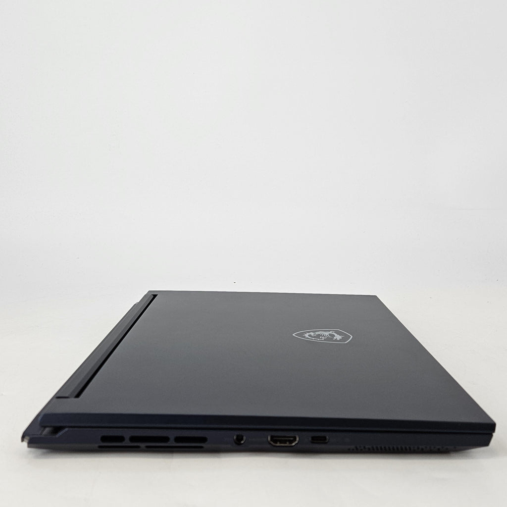 MSI Stealth 14 Studio 14 Blue 2.4 GHz Intel Core i7 13th Gen. 16GB RAM 1TB Solid State Drive NVIDIA GeForce RTX 4060 8 GB