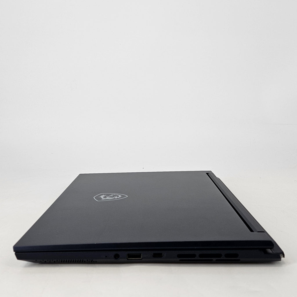 MSI Stealth 14 Studio 14 Blue 2.4 GHz Intel Core i7 13th Gen. 16GB RAM 1TB Solid State Drive NVIDIA GeForce RTX 4060 8 GB