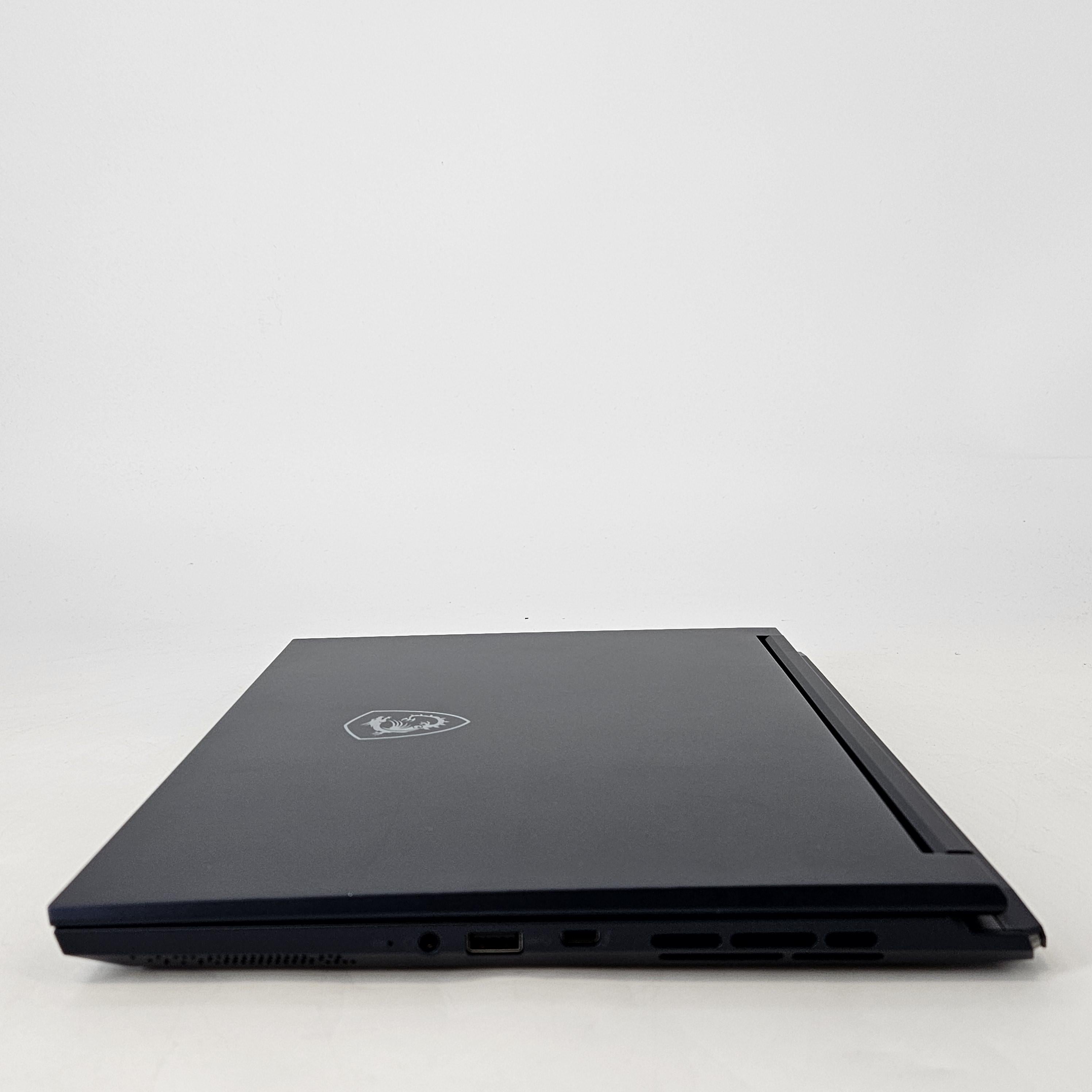 MSI Stealth 14 Studio 14 Blue 2.4 GHz Intel Core i7 13th Gen. 16GB RAM 1TB Solid State Drive NVIDIA GeForce RTX 4060 8 GB