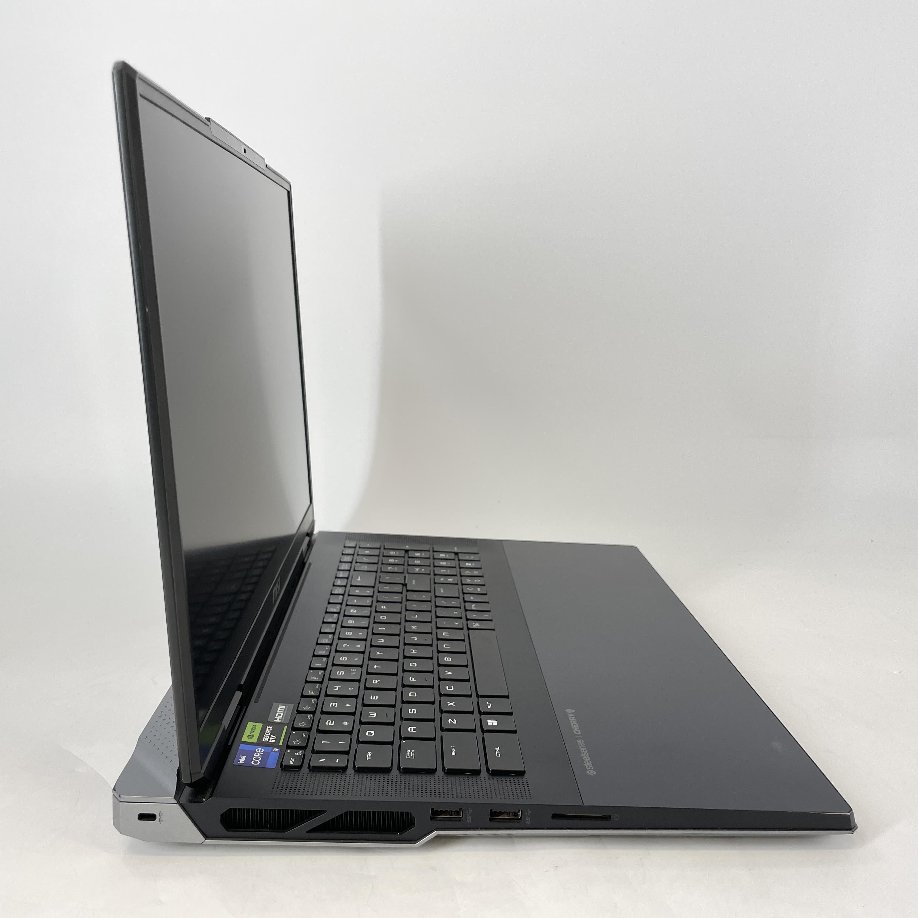 MSI Titan 18 HX 18 Black 2.2 GHz Intel Core i9 14th Gen. 128GB RAM 512GB Solid State Drive 1TB Solid State Drive NVIDIA GeForce RTX 4090 16 GB