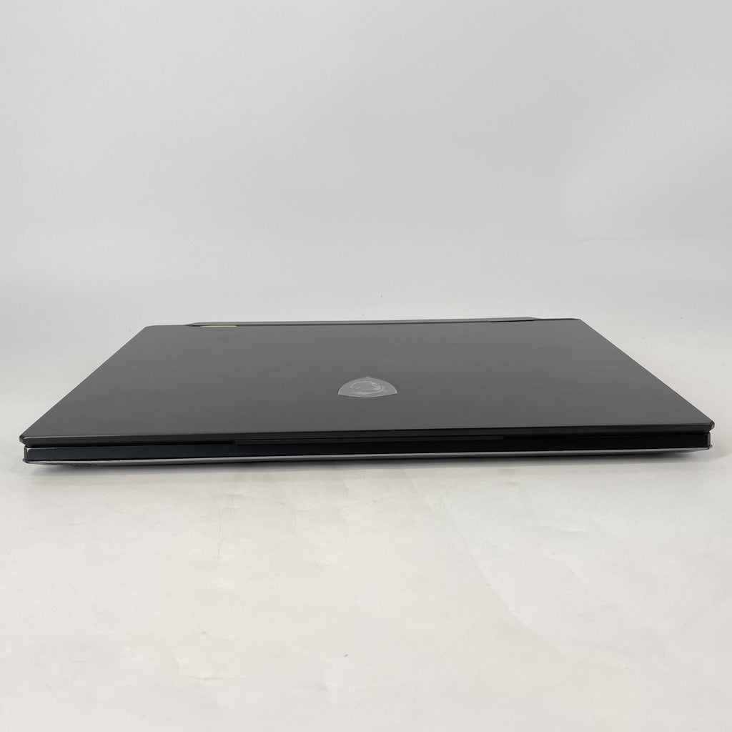 MSI Titan 18 HX 18 Black 2.2 GHz Intel Core i9 14th Gen. 128GB RAM 512GB Solid State Drive 1TB Solid State Drive NVIDIA GeForce RTX 4090 16 GB
