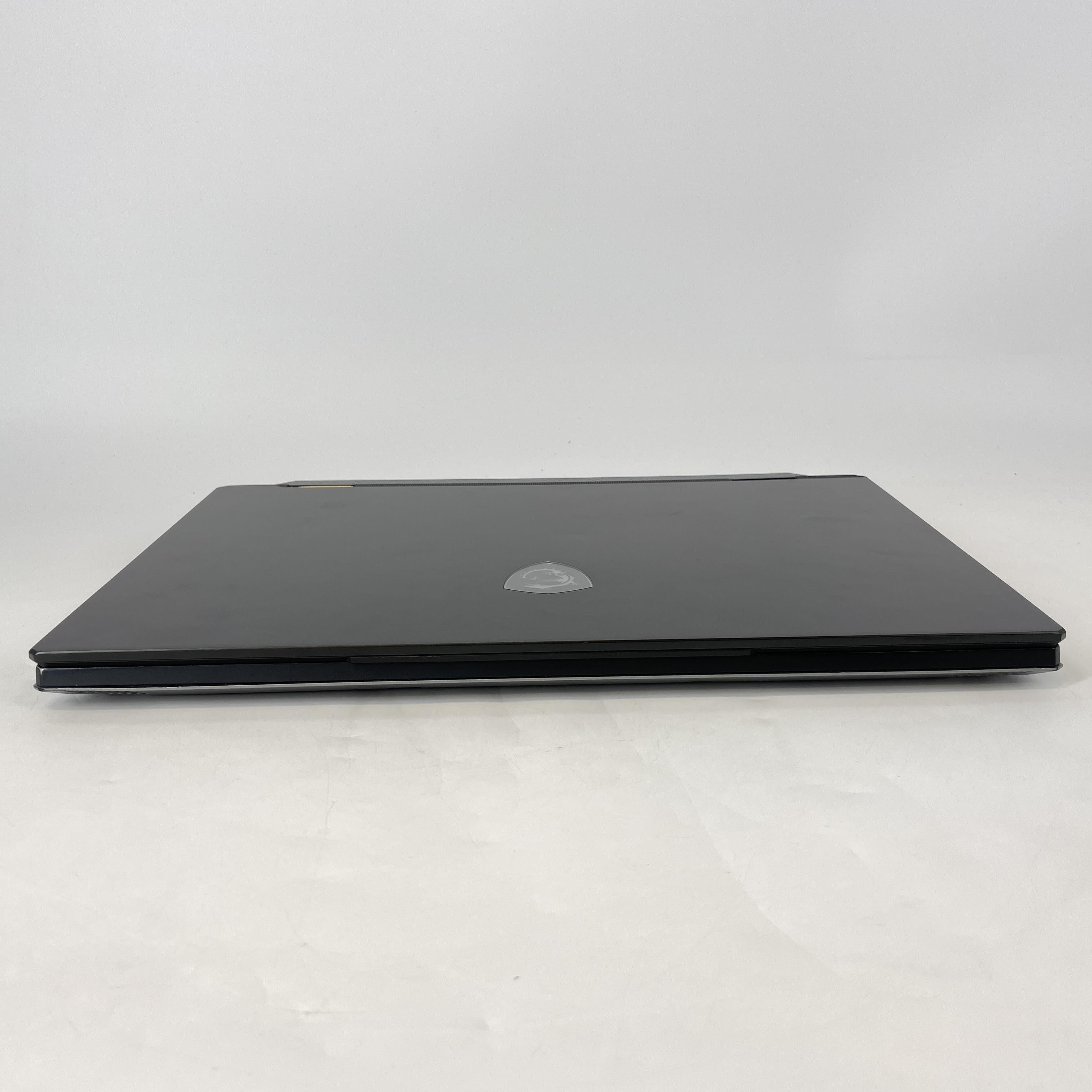 MSI Titan 18 HX 18 Black 2.2 GHz Intel Core i9 14th Gen. 128GB RAM 512GB Solid State Drive 1TB Solid State Drive NVIDIA GeForce RTX 4090 16 GB