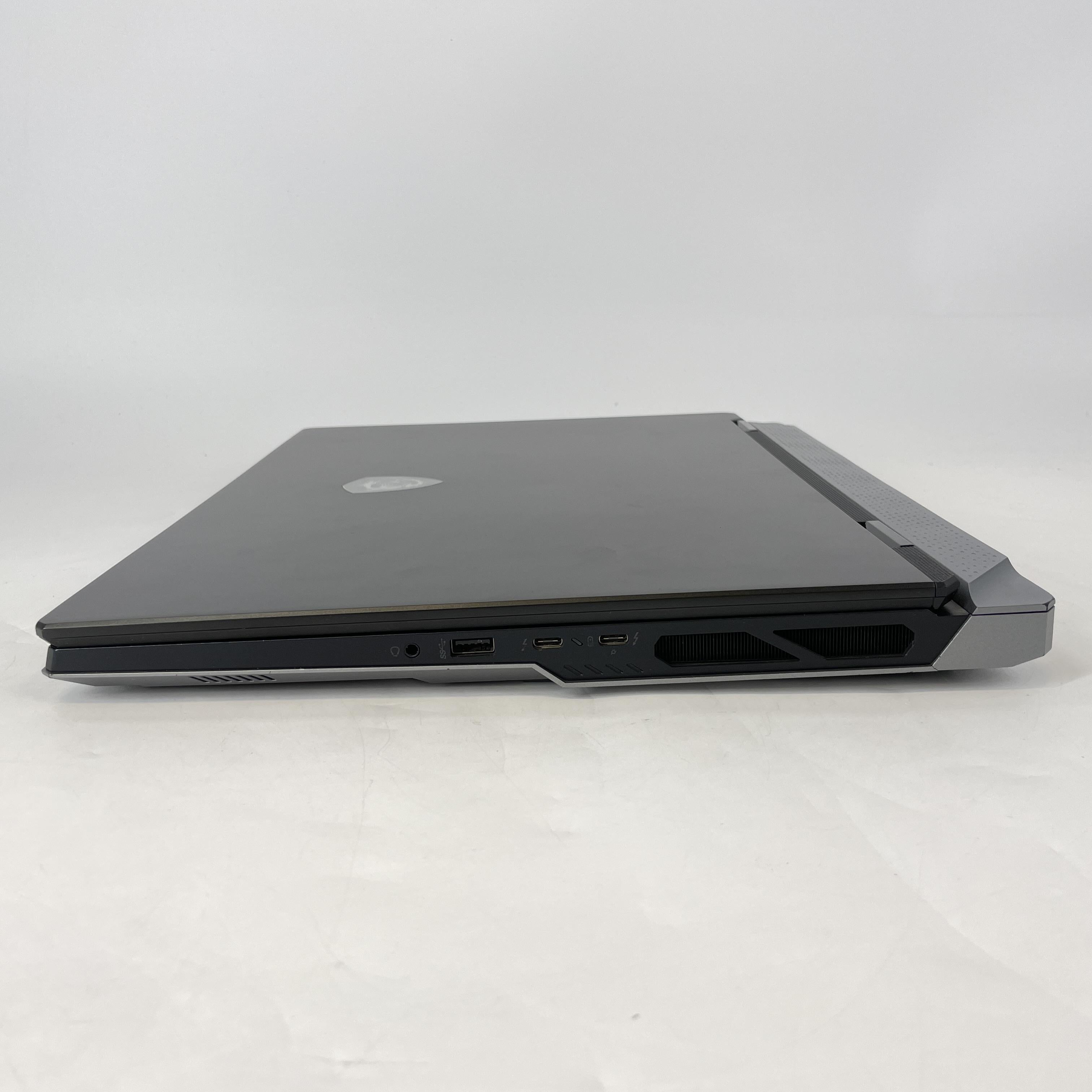 MSI Titan 18 HX 18 Black 2.2 GHz Intel Core i9 14th Gen. 128GB RAM 512GB Solid State Drive 1TB Solid State Drive NVIDIA GeForce RTX 4090 16 GB