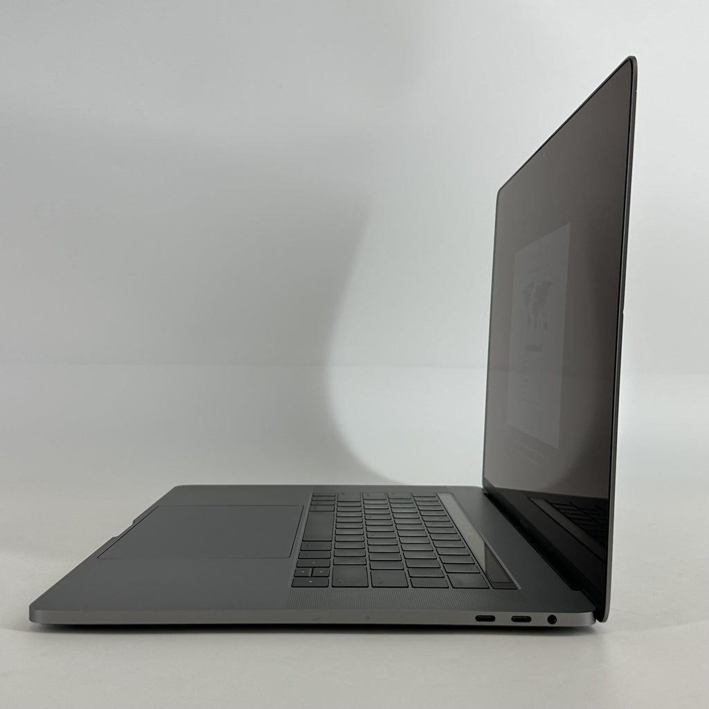 Apple MacBook Pro 15 Touch Bar 2017 Space Gray 3.1 GHz Intel Core i7 7th Gen. 16GB RAM 1TB Solid State Drive AMD Radeon Pro 560 4 GB